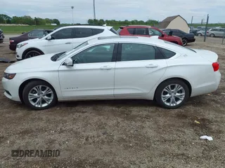 2015 Chevrolet Impala LT with VIN 1G1125S30FU140935, listed as a IAAI auction lot 42153988 with 147,828 mi miles and . Bid and sale history available at DreamBid. Image 14.