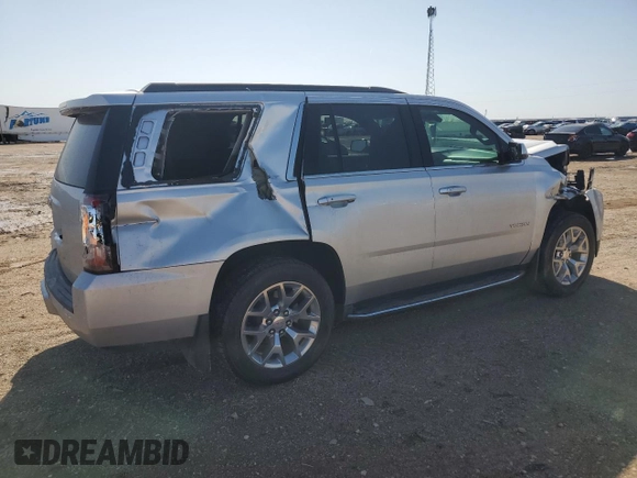 2017 GMC Yukon SLT with VIN 1GKS2BKC9HR345688, listed as a Copart auction lot 52303075 with 122,969 mi miles and Salvage Title. Bid and sale history available at carsss.com. Image 3.