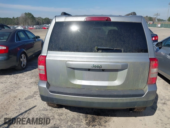 2014 Jeep Patriot Sport with VIN 1C4NJPBBXED757823, listed as a IAAI auction lot 41839740 with 186,218 mi miles and . Bid and sale history available at carsss.com. Image 16.