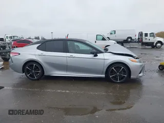 2020 Toyota Camry XSE with VIN 4T1K61AK1LU318098, listed as a IAAI auction lot 41097712 with 64,118 mi miles and . Bid and sale history available at DreamBid. Image 14.
