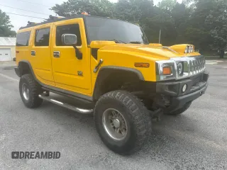 2003 Hummer H2 z VIN 5GRGN23U53H141743, wystawiony jako Copart lot #60153185 z przebiegiem 137 863 mil mil oraz Czysty tytuł • Clean title. Historia ofert i sprzedaży dostępna na DreamBid. Obrazek 1.