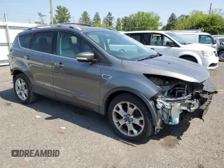2014 Ford Escape Titanium с VIN 1FMCU0J96EUD41199, выставлен на аукционе Copart как лот 59380245 с пробегом 100 319 миль миль и Списание • Salvage title. История ставок и продаж доступна на DreamBid. Изображение 4.