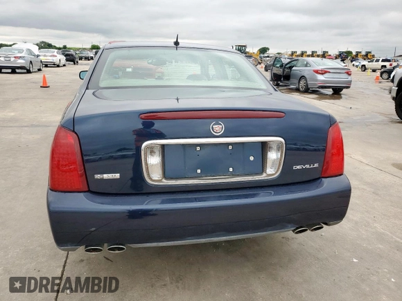 2005 Cadillac DeVille z VIN 1G6KD54Y75U129768, wystawiony jako Copart lot #55890325 z przebiegiem 97 463 mil mil oraz Czysty tytuł • Clean title. Historia ofert i sprzedaży dostępna na DreamBid. Obrazek 6.