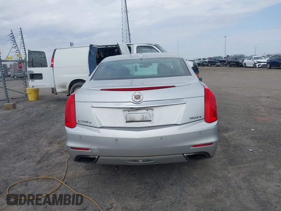 2014 Cadillac CTS Luxury AWD z VIN 1G6AX5SX2E0196881, wystawiony jako IAAI lot #41707633 z przebiegiem 169 168 mil mil oraz . Historia ofert i sprzedaży dostępna na DreamBid. Obrazek 16.