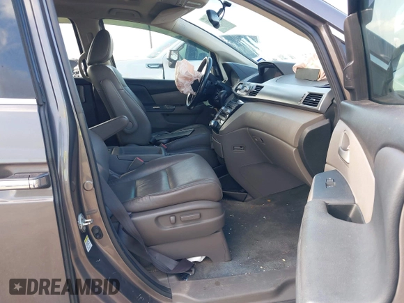 2011 Honda Odyssey Touring with VIN 5FNRL5H93BB104436, listed as a IAAI auction lot 40426003 with 93,342 mi miles and . Bid and sale history available at DreamBid. Image 5.