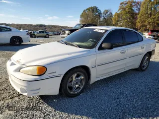 2003 Pontiac Grand Am GT with VIN 1G2NW52E73C208538, listed as a Copart auction lot 80742574 with 250,576 mi miles and Salvage Title. Bid and sale history available at carsss.com. Image 1.