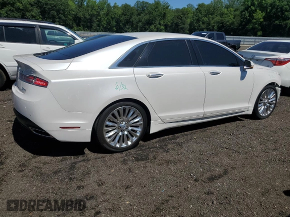 2015 Lincoln MKZ z VIN 3LN6L2JK8FR616661, wystawiony jako Copart lot #61588325 z przebiegiem 65 382 mil mil oraz Szkoda całkowita • Salvage title. Historia ofert i sprzedaży dostępna na DreamBid. Obrazek 3.