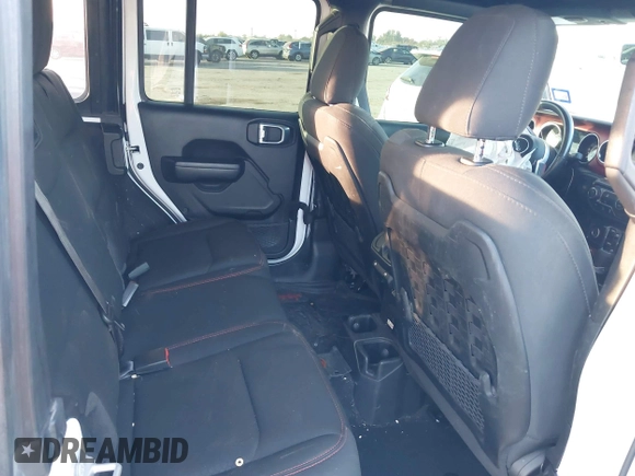 2022 Jeep Wrangler Unlimited Rubicon with VIN 1C4HJXFN4NW123803, listed as a IAAI auction lot 40994742 with 36,156 mi miles and . Bid and sale history available at DreamBid. Image 8.