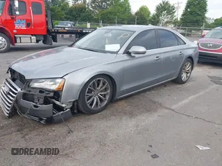 2011 Audi A8 with VIN WAUAVAFD0BN018197, listed as a IAAI auction lot 42221435 with 74,465 mi miles and . Bid and sale history available at DreamBid. Image 2.