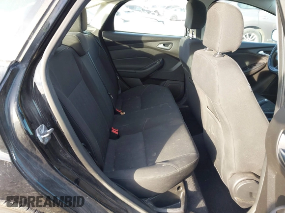 2016 Ford Focus SE z VIN 1FADP3FEXGL310270, wystawiony jako IAAI lot #40956503 z przebiegiem 156 812 mil mil oraz . Historia ofert i sprzedaży dostępna na DreamBid. Obrazek 8.