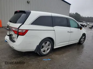 2011 Honda Odyssey Touring Elite with VIN 5FNRL5H94BB084410, listed as a Copart auction lot 48333585 with 223,851 mi miles and Salvage Title. Bid and sale history available at DreamBid. Image 3.