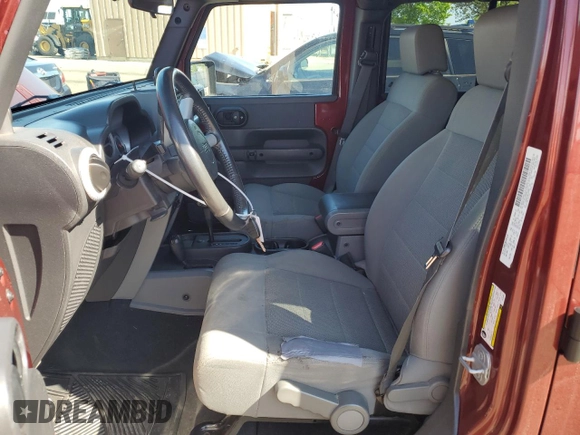 2008 Jeep Wrangler Unlimited Sahara with VIN 1J4GA59168L534967, listed as a Copart auction lot 54894635 with 180,581 mi miles and Salvage title. Bid and sale history available at DreamBid. Image 7.