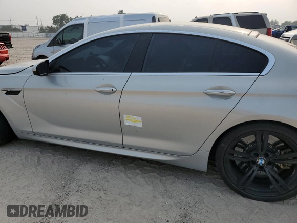 2017 BMW M6 z VIN WBS6E9C56HG437374, wystawiony jako Copart lot #54277624 z przebiegiem 80 858 mil mil oraz . Historia ofert i sprzedaży dostępna na DreamBid. Obrazek 12.