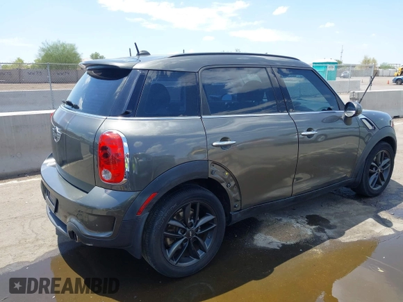 2014 MINI Countryman S with VIN WMWZC3C59EWP29137, listed as a IAAI auction lot 42661922 with 128,064 mi miles and . Bid and sale history available at DreamBid. Image 6.