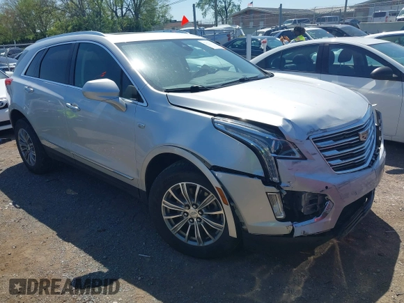 2017 Cadillac XT5 Luxury FWD z VIN 1GYKNBRS6HZ231609, wystawiony jako IAAI lot #42043791 z przebiegiem 106 594 mil mil oraz . Historia ofert i sprzedaży dostępna na DreamBid. Obrazek 1.