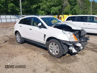 2010 Cadillac SRX Luxury Collection z VIN 3GYFNAEYXAS619810, wystawiony jako IAAI lot #42202650 z przebiegiem 154 823 mil mil oraz . Historia ofert i sprzedaży dostępna na DreamBid. Obrazek 1.