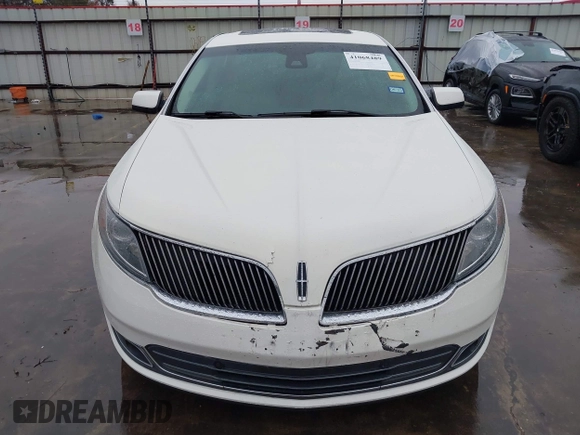 2013 Lincoln MKS with VIN 1LNHL9DK4DG605058, listed as a IAAI auction lot 41068489 with 101,801 mi miles. Bid and sale history available at carsss.com. Image 13.
