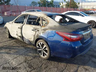 2018 Nissan Altima 2.5 SL with VIN 1N4AL3AP1JC119920, listed as a IAAI auction lot 41387558 with 1 mi miles. Bid and sale history available at carsss.com. Image 3.
