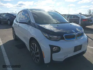2014 BMW i3 with VIN WBY1Z4C5XEV276199, listed as a IAAI auction lot 41229581 with 68,265 mi miles. Bid and sale history available at carsss.com. Image 1.