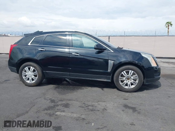 2014 Cadillac SRX Luxury Collection z VIN 3GYFNEE30ES650372, wystawiony jako IAAI lot #42195783 z przebiegiem 169 113 mil mil oraz . Historia ofert i sprzedaży dostępna na DreamBid. Obrazek 13.