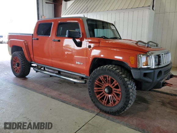 2009 Hummer H3 with VIN 5GNEN13E998144228, listed as a Copart auction lot 70231814 with 119,203 mi miles and Clean Title. Bid and sale history available at DreamBid. Image 4.