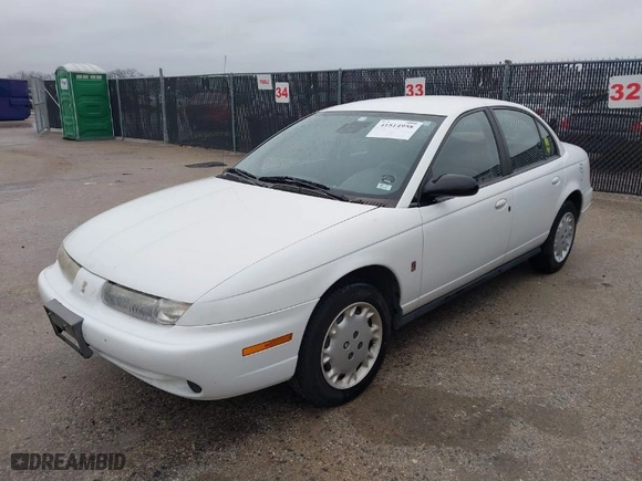 1997 Saturn SL with VIN 1G8ZK5274VZ196952, listed as a IAAI auction lot 41514958 with 125,683 mi miles. Bid and sale history available at carsss.com. Image 6.