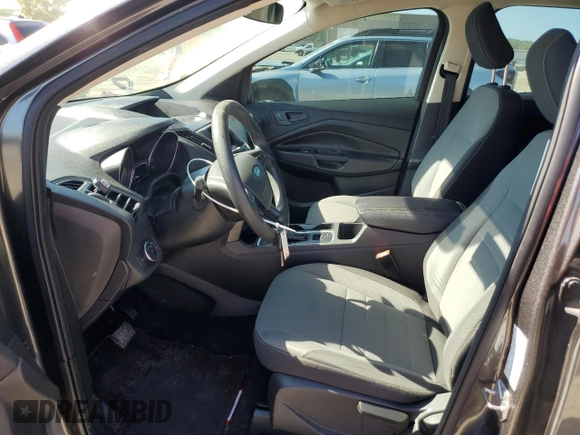 2018 Ford Escape S with VIN 1FMCU0F7XJUA28402, listed as a Copart auction lot 57955745 with 104,625 mi miles and Salvage title. Bid and sale history available at DreamBid. Image 7.