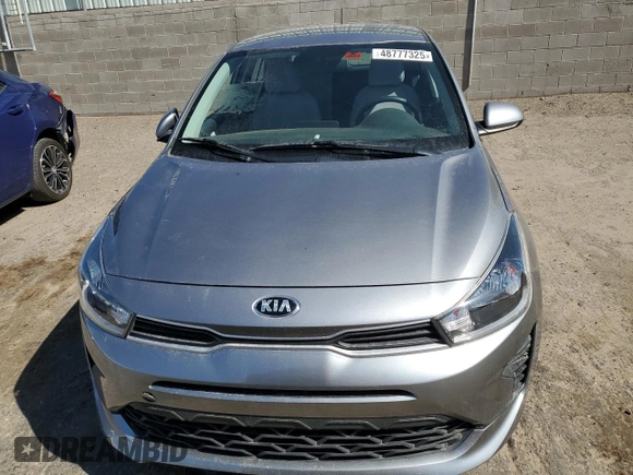 2021 Kia Rio S with VIN 3KPA25AD3ME382938, listed as a Copart auction lot 48777325 with Not Provided miles and Salvage Title. Bid and sale history available at DreamBid. Image 5.