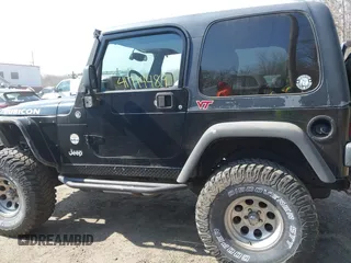 2004 Jeep Wrangler Rubicon with VIN 1J4FA69S64P789308, listed as a IAAI auction lot 41714489 with 186,302 mi miles. Bid and sale history available at carsss.com. Image 14.