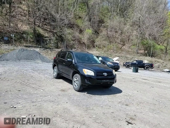 2009 Toyota RAV4 with VIN JTMBF33V69D011297, listed as a Copart auction lot 53891415 with 122,068 mi miles and Salvage Title. Bid and sale history available at carsss.com. Image 14.
