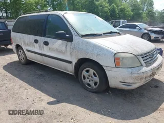 2006 Ford Freestar SE z VIN 2FMZA51626BA54942, wystawiony jako IAAI lot #42133277 z przebiegiem 119 296 mil mil oraz . Historia ofert i sprzedaży dostępna na DreamBid. Obrazek 1.