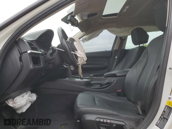 2013 BMW 3 Series 320i xDrive with VIN WBA3C3C51DF978651, listed as a Copart auction lot 58507915 with 117,025 mi miles and Salvage title. Bid and sale history available at DreamBid. Image 7.