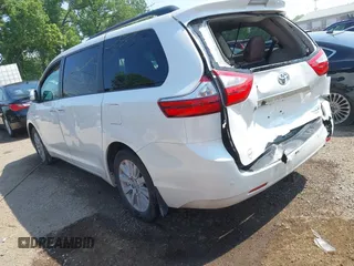 2017 Toyota Sienna XLE z VIN 5TDDZ3DC5HS150577, wystawiony jako IAAI lot #42431875 z przebiegiem 108 275 mil mil oraz . Historia ofert i sprzedaży dostępna na DreamBid. Obrazek 3.