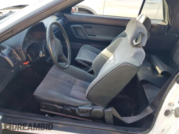 1989 Toyota Celica z VIN JT5ST62K8K7343548, wystawiony jako Copart lot #73774594 z przebiegiem 87 477 mil mil oraz Szkoda całkowita • Salvage title. Historia ofert i sprzedaży dostępna na DreamBid. Obrazek 7.