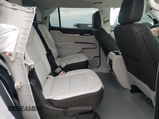 2024 GMC Acadia FWD Denali z VIN 1GKENLKS3RJ164796, wystawiony jako Copart lot #69429724 z przebiegiem 4977 mil mil oraz Szkoda całkowita • Salvage title. Historia ofert i sprzedaży dostępna na DreamBid. Obrazek 11.