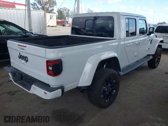 2023 Jeep Gladiator Overland with VIN 1C6HJTFG7PL543870, listed as a IAAI auction lot 42056969 with 28,655 mi miles and . Bid and sale history available at DreamBid. Image 4.