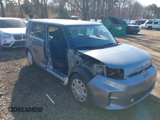 2012 Scion xB with VIN JTLZE4FE1CJ010574, listed as a IAAI auction lot 41858422 with 65,862 mi miles. Bid and sale history available at carsss.com. Image 6.