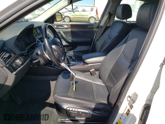 2015 BMW X4 xDrive28i with VIN 5UXXW3C57F0M88277, listed as a Copart auction lot 61388634 with 110,962 mi miles and Salvage title. Bid and sale history available at DreamBid. Image 7.
