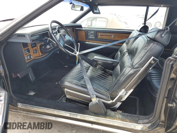 1985 Cadillac Eldorado z VIN 1G6EL578XFE614641, wystawiony jako Copart lot #75663984 z przebiegiem 54 128 mil mil oraz Szkody całkowita. Historia ofert i sprzedaży dostępna na DreamBid. Obrazek 7.