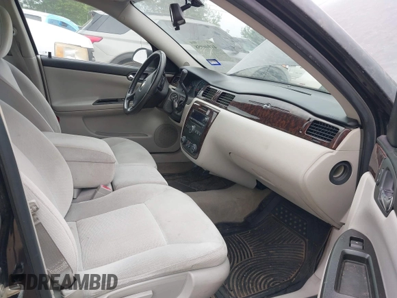 2013 Chevrolet Impala LT with VIN 2G1WB5E30D1202571, listed as a IAAI auction lot 41946958 with 104,291 mi miles and . Bid and sale history available at DreamBid. Image 5.