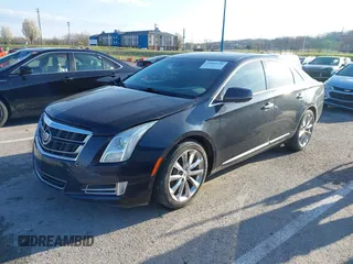 2013 Cadillac XTS Premium with VIN 2G61T5S32D9237829, listed as a IAAI auction lot 41863539 with 149,661 mi miles. Bid and sale history available at carsss.com. Image 2.