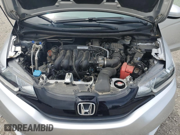 2015 Honda Fit LX z VIN 3HGGK5H51FM729802, wystawiony jako Copart lot #59997735 z przebiegiem 38 776 mil mil oraz Szkoda całkowita • Salvage title. Historia ofert i sprzedaży dostępna na DreamBid. Obrazek 11.