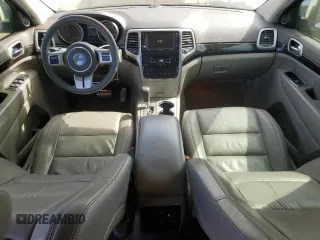 2012 Jeep Grand Cherokee Laredo with VIN 1C4RJEAG0CC222943, listed as a Copart auction lot 52899545 with 153,389 mi miles and Salvage Title. Bid and sale history available at carsss.com. Image 8.