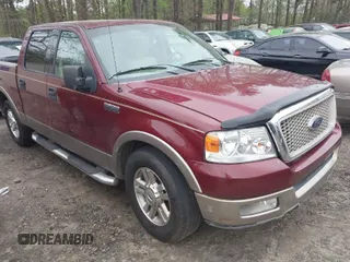 2004 Ford F-150 XLT with VIN 1FTPW12564KD77115, listed as a IAAI auction lot 41929386 with 213,172 mi miles. Bid and sale history available at carsss.com. Image 1.