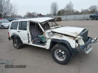 1996 Jeep Cherokee SE z VIN 1J4FJ28S6TL230275, wystawiony jako IAAI lot #41731116 z przebiegiem 172 361 mil mil oraz . Historia ofert i sprzedaży dostępna na DreamBid. Obrazek 1.