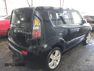 2010 Kia Soul + with VIN KNDJT2A21A7095510, listed as a IAAI auction lot 41879972 with 212,538 mi miles. Bid and sale history available at carsss.com. Image 4.