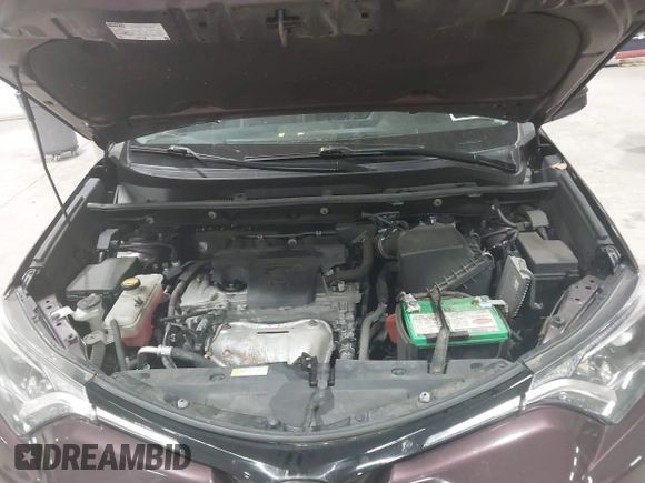 2018 Toyota RAV4 LE with VIN 2T3BFREV0JW759714, listed as a IAAI auction lot 41823084 with 119,909 mi miles and . Bid and sale history available at DreamBid. Image 10.