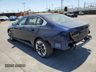 2024 BMW 5 Series 530i with VIN WBA43FJ06RCR00808, listed as a Copart auction lot 60520224 with 4,803 mi miles and Salvage Title. Bid and sale history available at carsss.com. Image 2.
