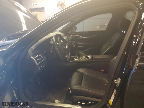 2018 BMW 7 Series 750i xDrive with VIN WBA7F2C52JB238158, listed as a Copart auction lot 76392134 with 0 mi miles and Salvage Title. Bid and sale history available at carsss.com. Image 7.
