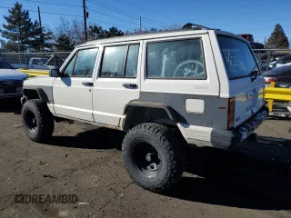 1996 Jeep Cherokee Sport with VIN 1J4FJ68S7TL325967, listed as a Copart auction lot 43654245 with 204,182 mi miles and Salvage Title. Bid and sale history available at carsss.com. Image 2.